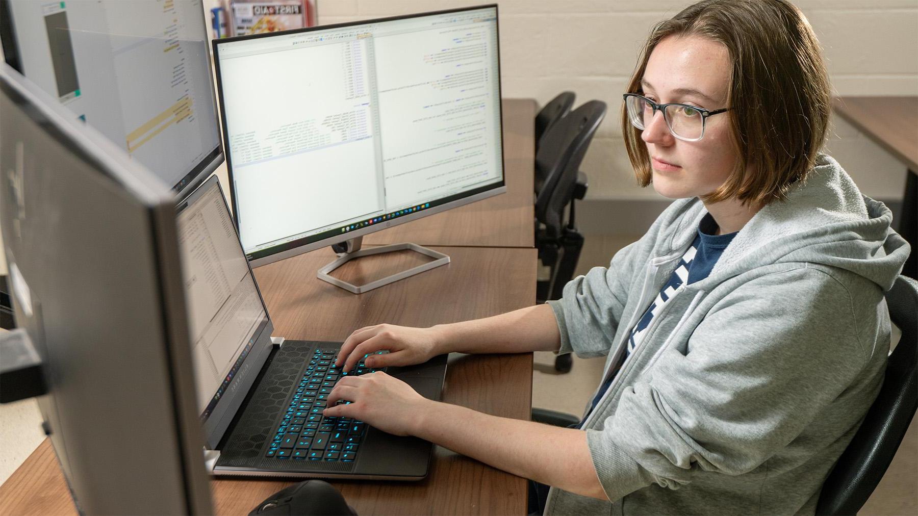 Student working on a coding project